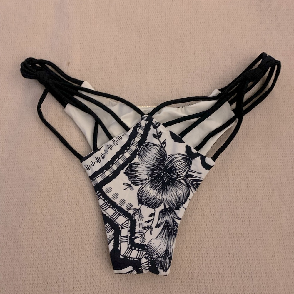 Single piece bikini. Matches with any black top.
